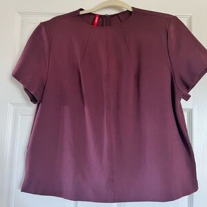 Zip in back short top